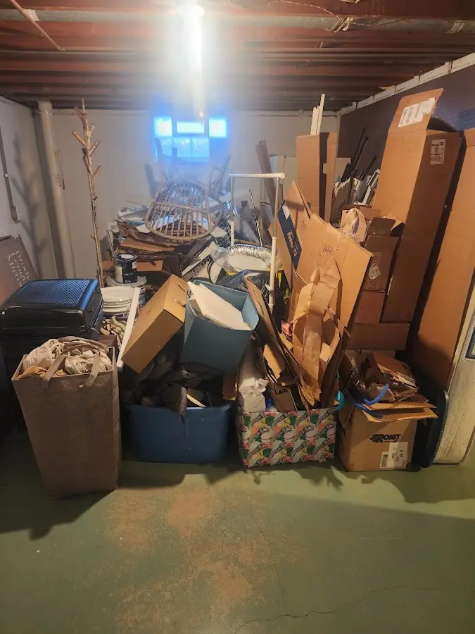 Roll-off dumpster container at job site for Concrete Dumpster Rental in Osceola